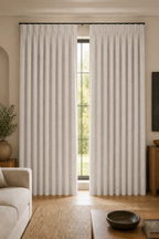 Xpro Home 2679-1 Soft Ivory custom blackout curtains in a warm modern living room
